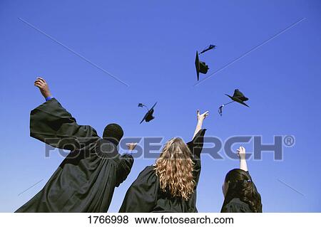 Tossing caps View Large Photo Image Stock Photo - Tossing caps. Fotosearch