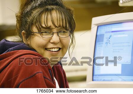 Woman at computer View Large Photo Image Picture - Woman at computer. Fotosearch