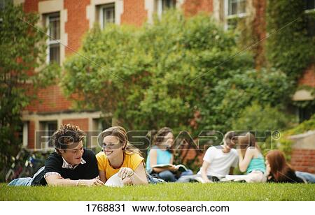 Stock Image - A group of students working together. Fotosearch
