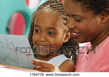 Admiring a coloring View Large Photo Image Stock Photo - Admiring a coloring. Fotosearch