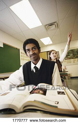 Black student in class View Large Photo Image Stock Photo - Black student in class. Fotosearch