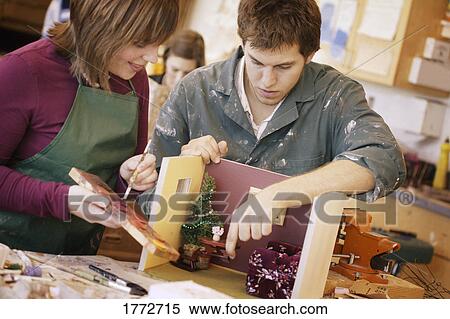 Stock Photography - Making a model house. Fotosearch