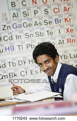 Male student in Chemistry class View Large Photo Image Stock Image - Male student in Chemistry class. Fotosearch