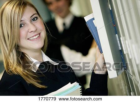 Stock Photo - Pretty teenage female student. Fotosearch