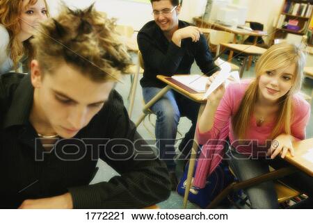 Stock Image - Student with paper airplane. Fotosearch