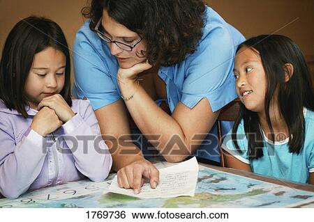 Teaching children View Large Photo Image Stock Photograph - Teaching children. Fotosearch