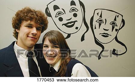 Teenage students masks in background View Large Photo Image Stock Image - Teenage students masks in background. Fotosearch