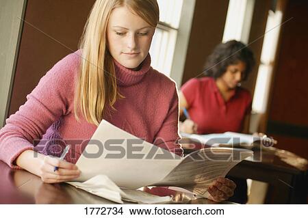 Young woman studying View Large Photo Image Picture - Young woman studying. Fotosearch