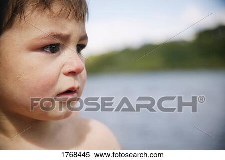 A small child crying View Large Photo Image Stock Photography - A small child crying. Fotosearch