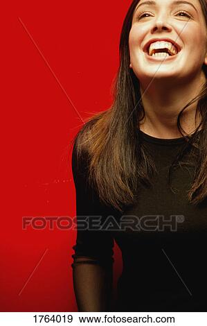 A woman laughs View Large Photo Image Stock Photo - A woman laughs. Fotosearch