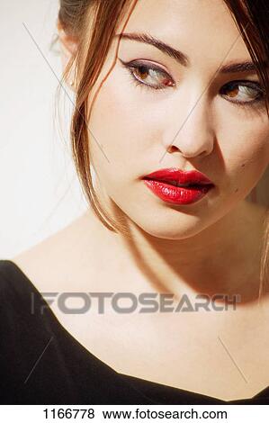 Closeup of woman's face View Large Photo Image Stock Photo - Closeup of woman's face. Fotosearch