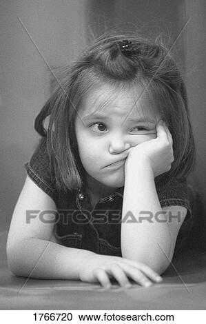 Stock Image - Girl with a silly expression. Fotosearch