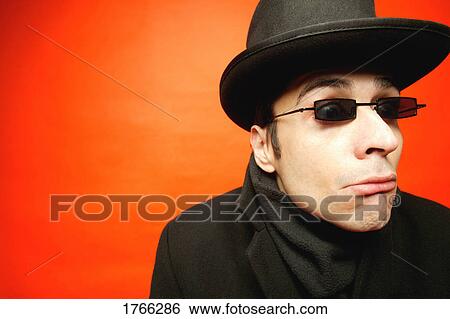 Stock Photograph - Man with smirk. Fotosearch