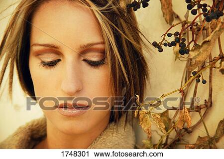 Stock Image - Woman wearing fall fashion. Fotosearch