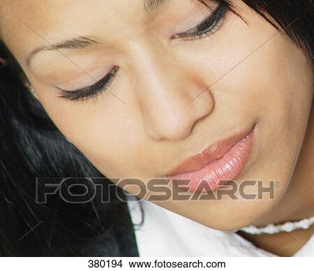 Picture - Woman's face closeup. Fotosearch