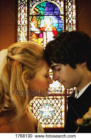 Couple in a church View Large Photo Image Stock Image - Couple in a church. Fotosearch