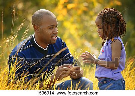 Picture - Father and daughter spend time together. Fotosearch