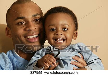 Stock Photography - Father and son. Fotosearch