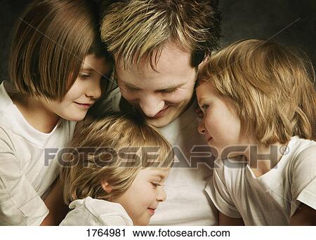 Father with three girls View Large Photo Image Stock Image - Father with three girls. Fotosearch