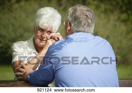 Picture - Man comforting woman. Fotosearch