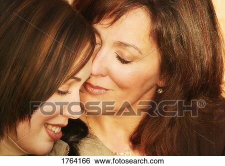 Mother and daughter share a special moment View Large Photo Image Stock Photograph - Mother and daughter share a special moment. Fotosearch