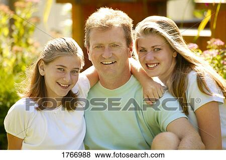 Stock Photo - Portrait of a family. Fotosearch