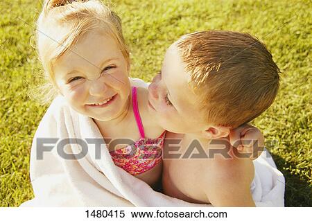 Boy and girl share a towel View Large Photo Image Stock Photography - Boy and girl share a towel. Fotosearch