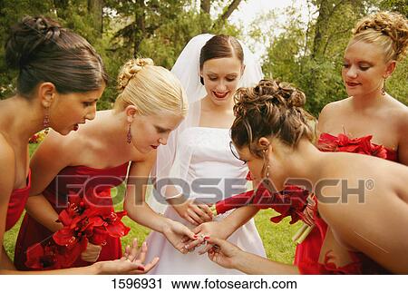 Bridesmaids admire ring View Large Photo Image Stock Image - Bridesmaids admire ring. Fotosearch