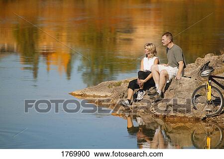 Couple enjoying the scenery View Large Photo Image Stock Image - Couple enjoying the scenery. Fotosearch