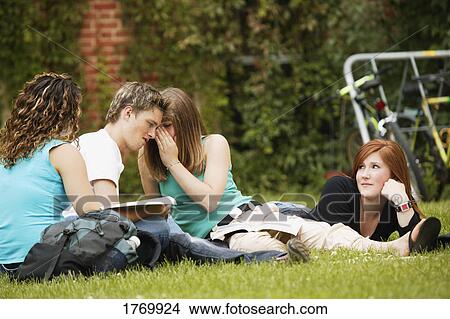 Friends studying outside View Large Photo Image Picture - Friends studying outside. Fotosearch