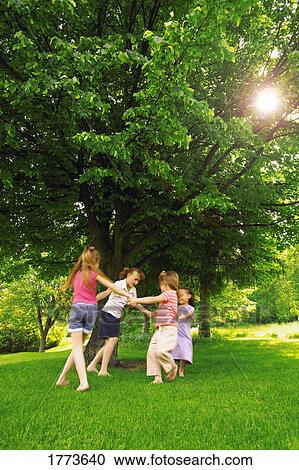 Girls playing together View Large Photo Image Stock Image - Girls playing together. Fotosearch