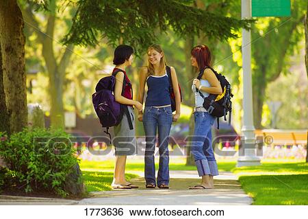 Stock Photograph - Group of girls talking. Fotosearch