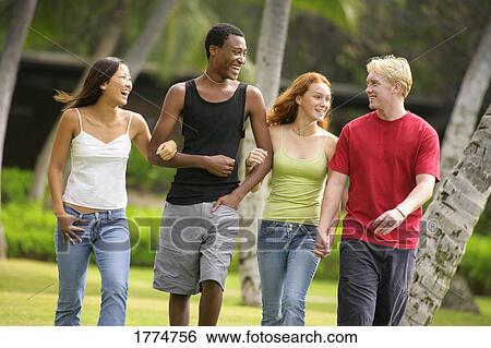 Stock Photograph - Group walking. Fotosearch