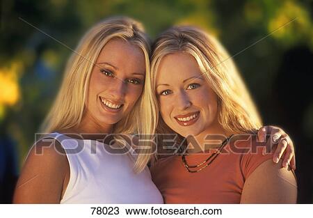 Stock Image - Portrait of two teen girls. Fotosearch