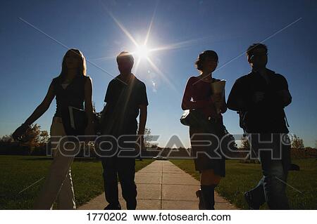 Silhouette group walking View Large Photo Image Stock Image - Silhouette group walking. Fotosearch