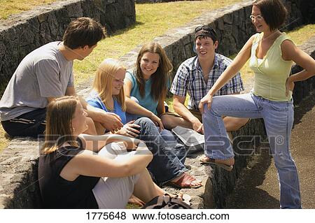 Teenagers hanging out View Large Photo Image Stock Photo - Teenagers hanging out. Fotosearch