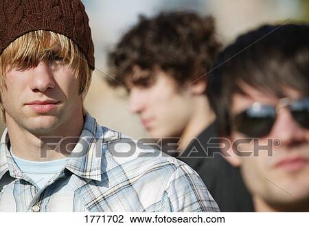 Three young men View Large Photo Image Stock Image - Three young men. Fotosearch