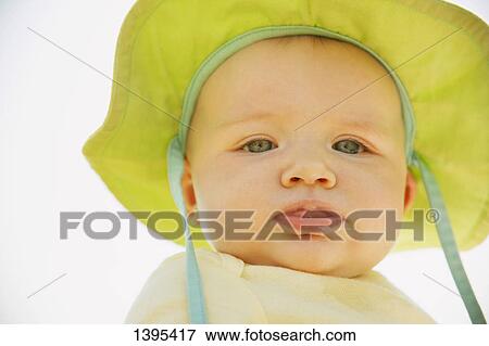 Baby with hat View Large Photo Image Stock Photo - Baby with hat. Fotosearch