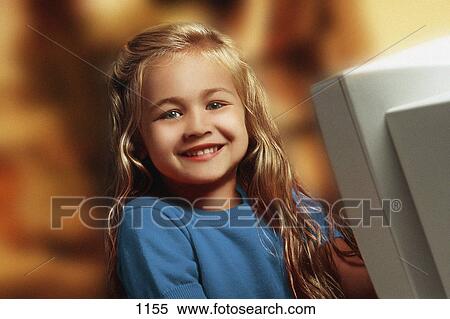 Child in front of computer View Large Photo Image Stock Photography - Child in front of computer. Fotosearch