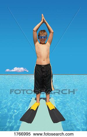 Child prepares to dive View Large Photo Image Stock Photography - Child prepares to dive. Fotosearch