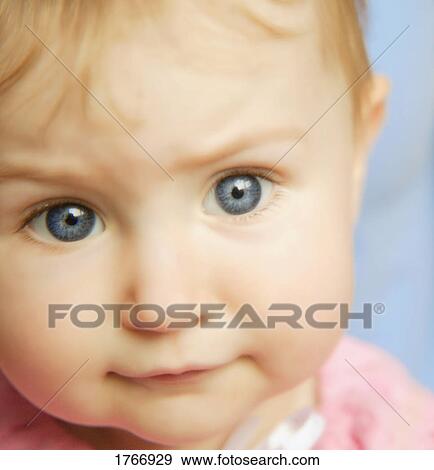 Closeup of a baby's face View Large Photo Image Stock Photo - Closeup of a baby's face. Fotosearch