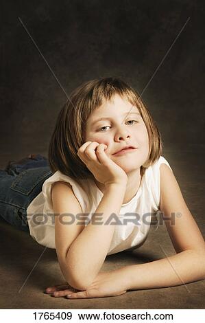 Stock Photo - Girl with white t-shirt. Fotosearch