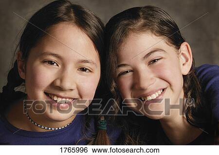 Stock Photograph - Portrait of two friends. Fotosearch