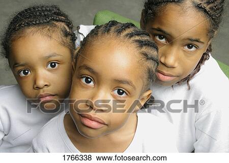 Stock Photo - Three young girls. Fotosearch