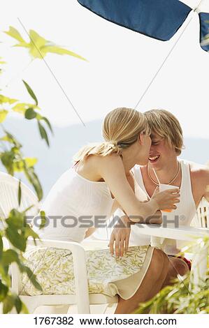 A couple share a laugh View Large Photo Image Stock Image - A couple share a laugh. Fotosearch