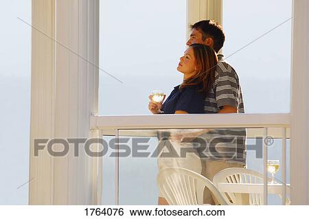 Couple enjoy a vacation View Large Photo Image Stock Photograph - Couple enjoy a vacation. Fotosearch