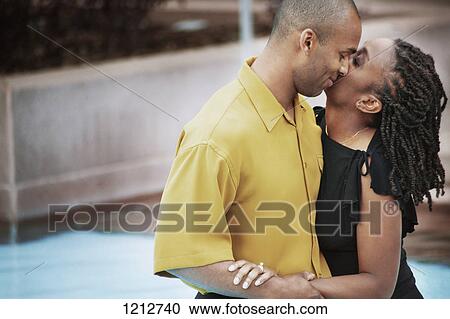 Stock Image - Couple kiss. Fotosearch