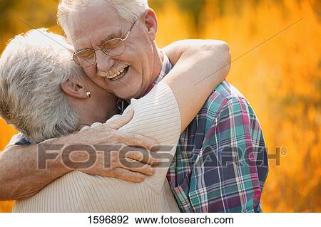 Stock Image - Couple laughing. Fotosearch