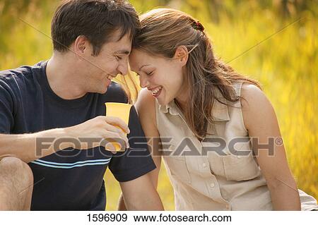 Couple sharing time together View Large Photo Image Stock Photo - Couple sharing time together. Fotosearch