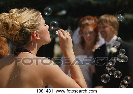 Guest blows bubbles View Large Photo Image Stock Image - Guest blows bubbles. Fotosearch